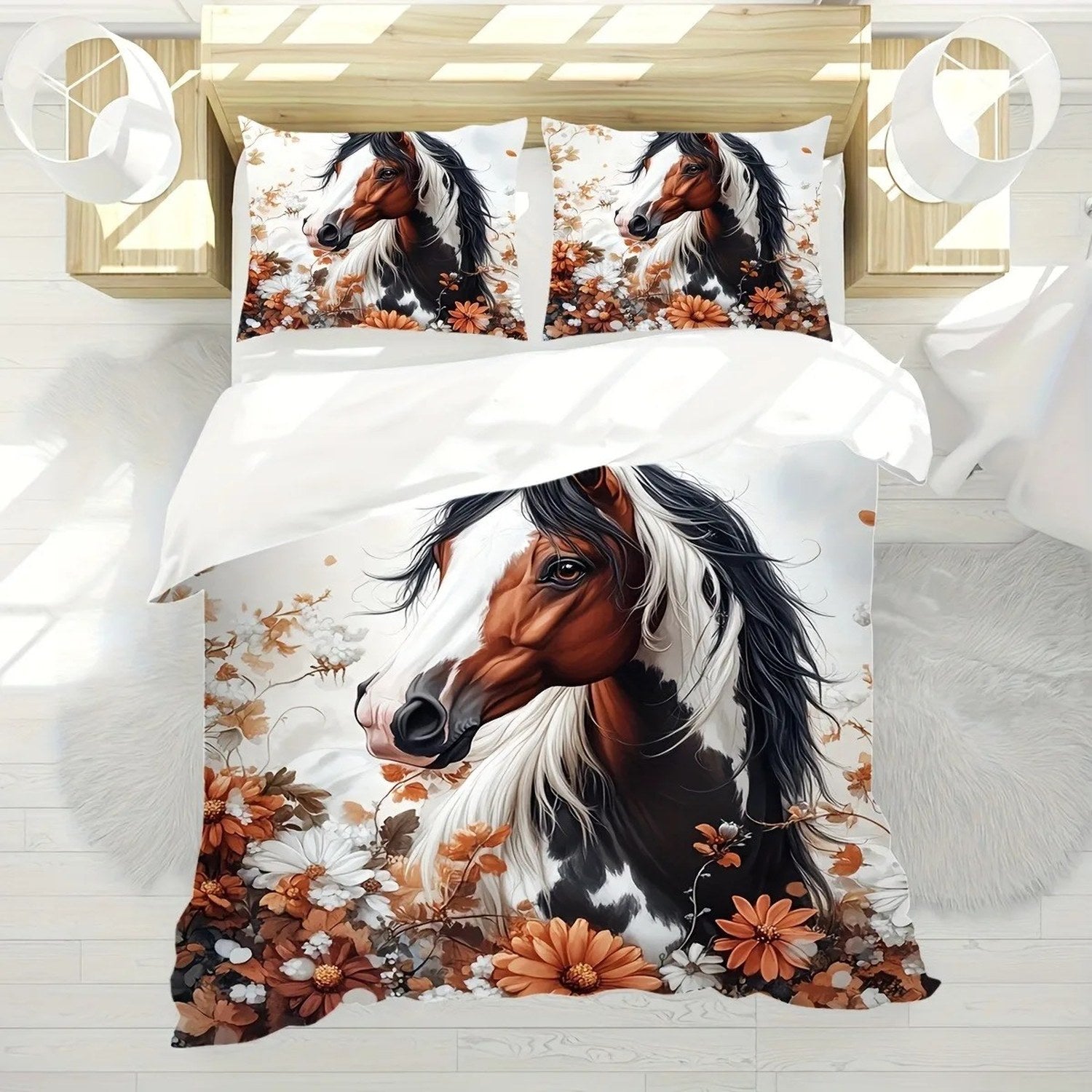 Vue de dessus d'un lit habillé de la parure cheval avec ses deux taies d'oreiller