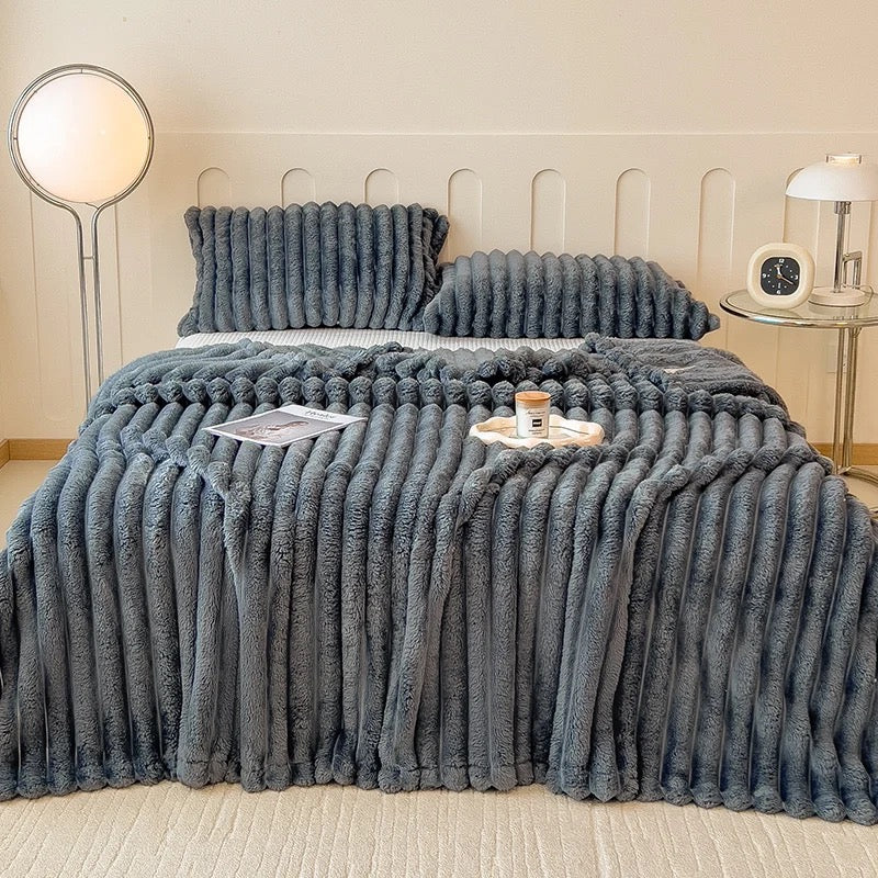Plaid flanelle rayé plié montrant les différentes couleurs disponibles