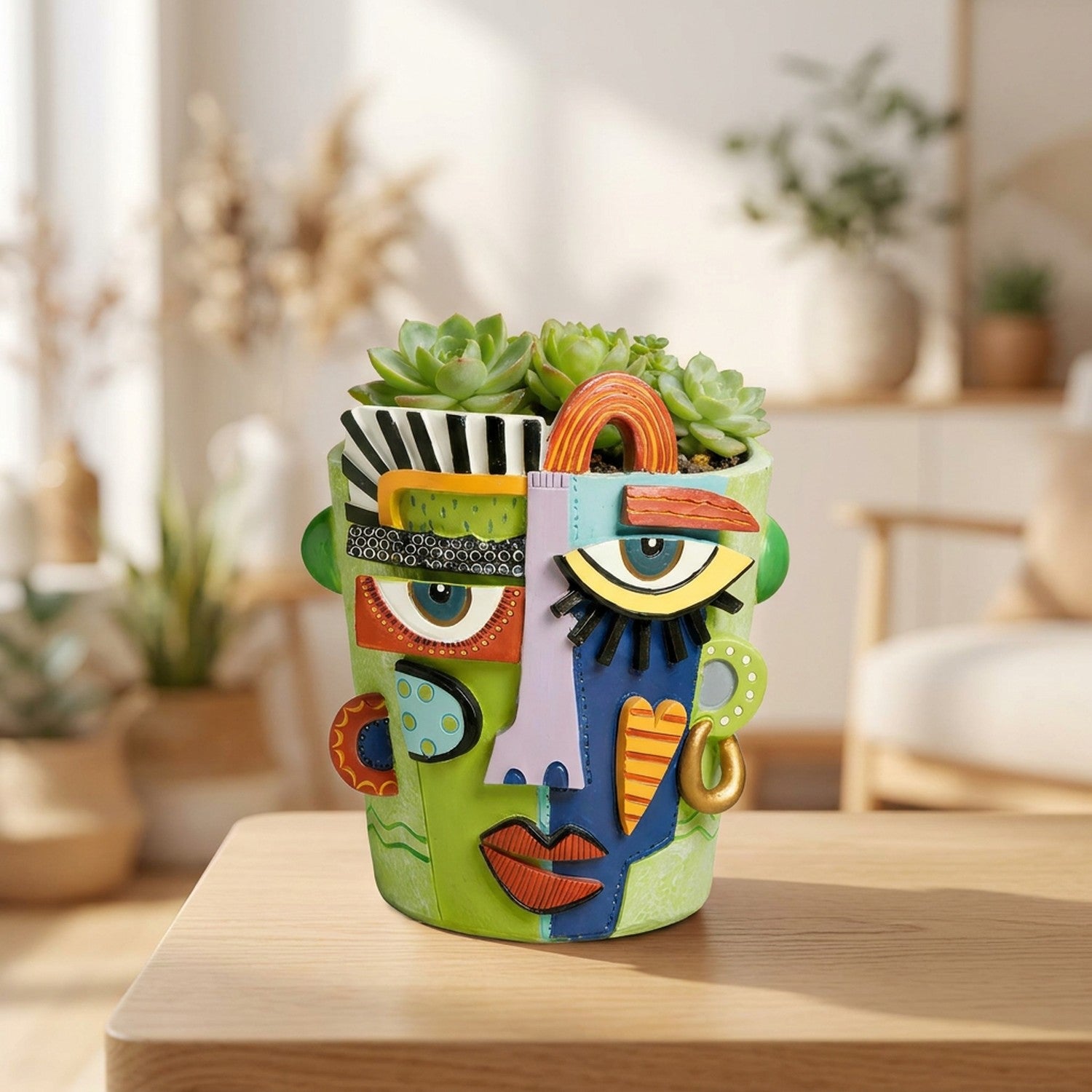 Pot de fleur visage abstrait style cubiste en résine sculptée verte avec succulente