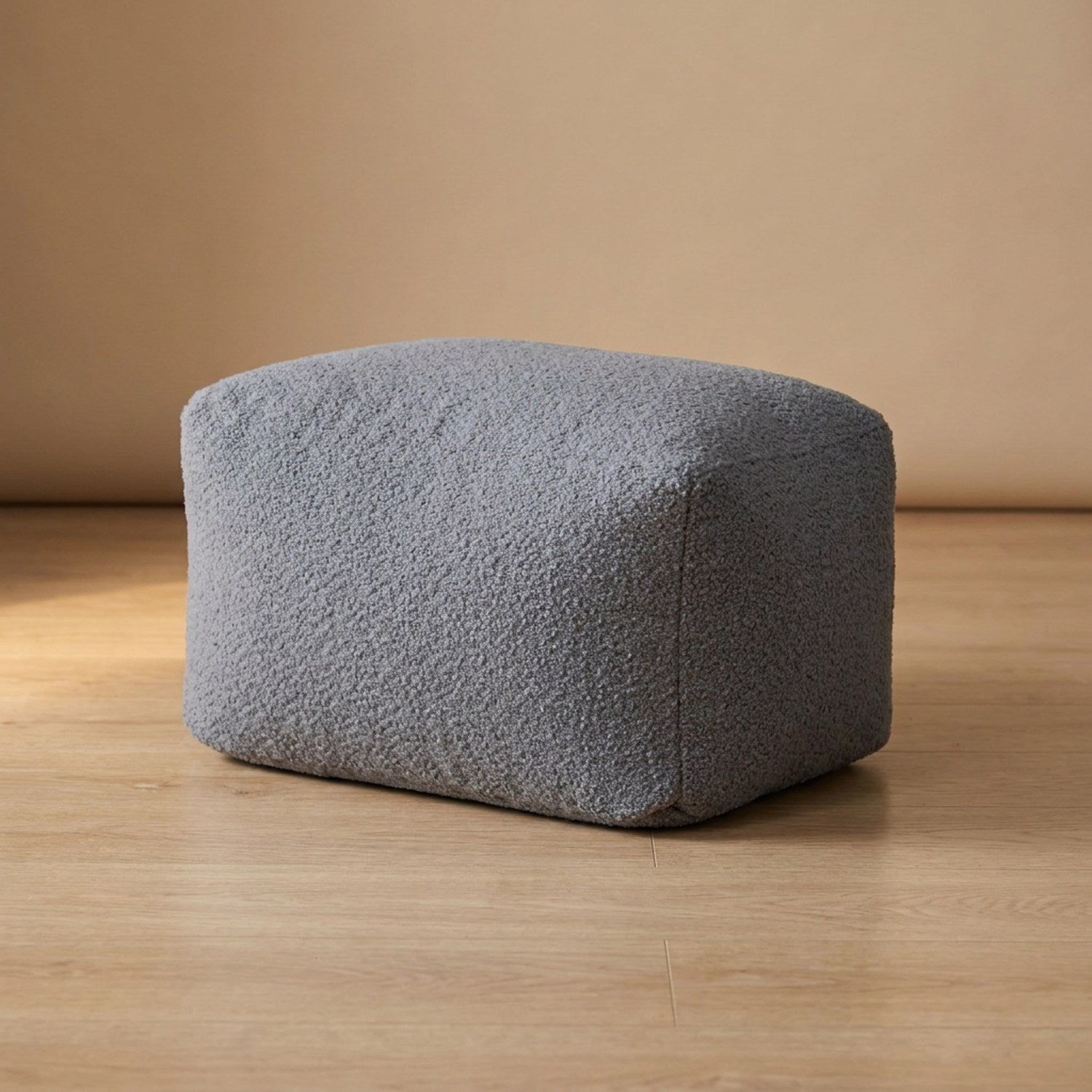 Housse de pouf bouclé gris forme tabouret vue de face
