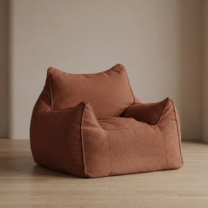 Housse de pouf bouclé marron forme fauteuil vue de face