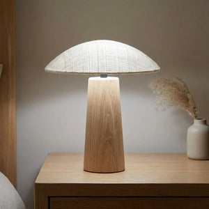 Lampe de chevet champignon en bois avec lumière blanche réglable sur une table de nuit