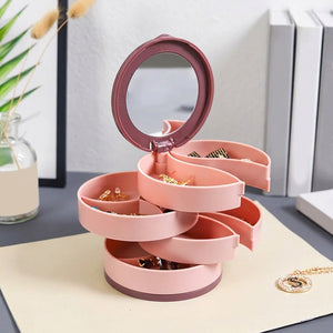 Boîte à bijoux rotative coloris Rose