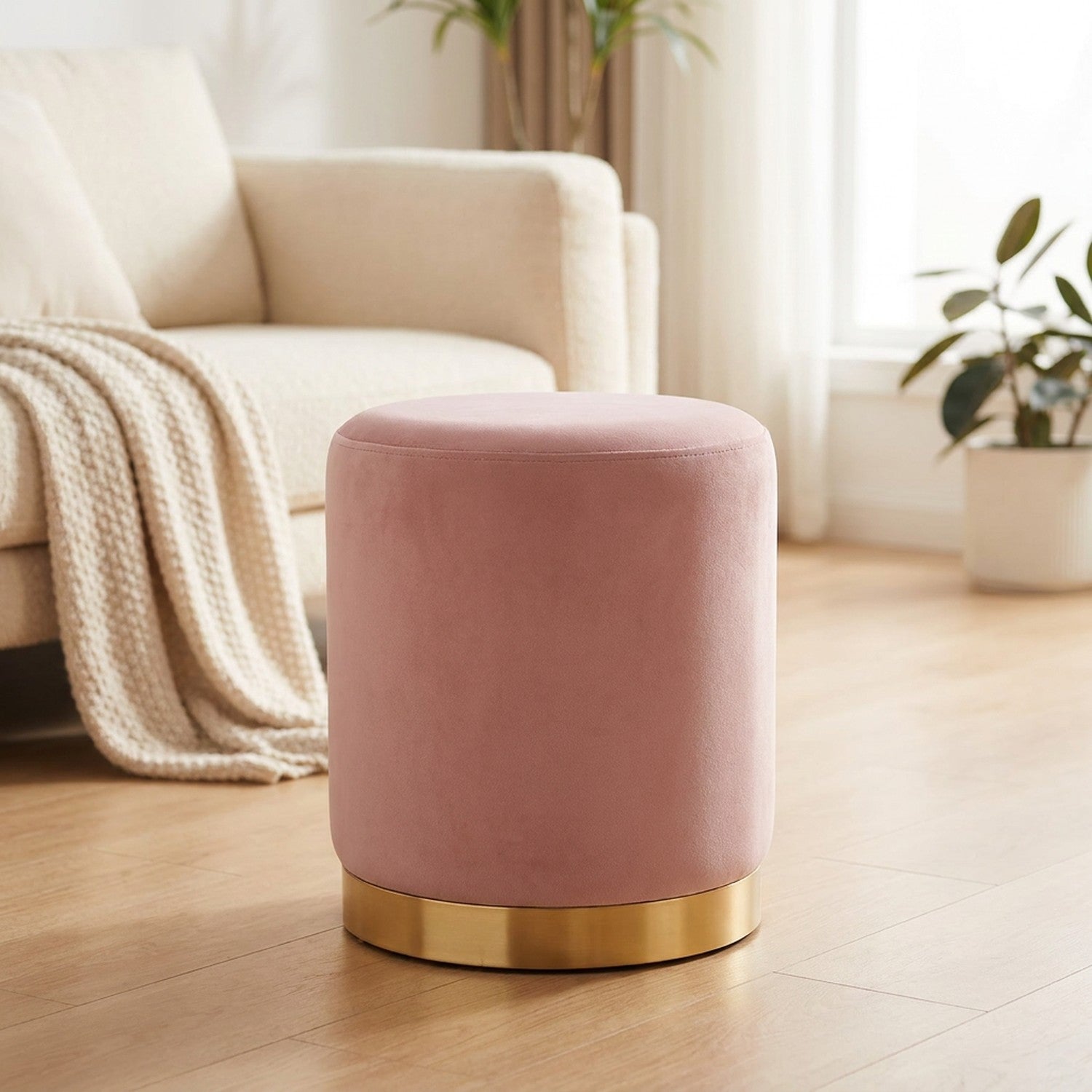 Tabouret rond en velours rose poudré avec socle doré