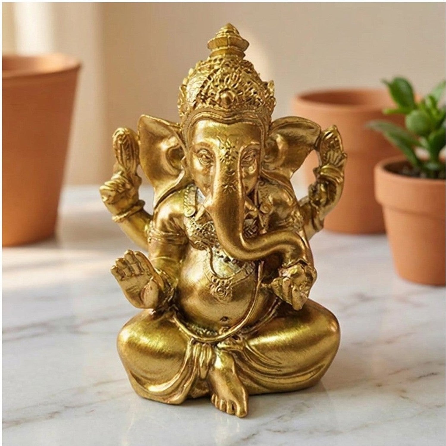 Statue Ganesha doré modèle classique en décor zen