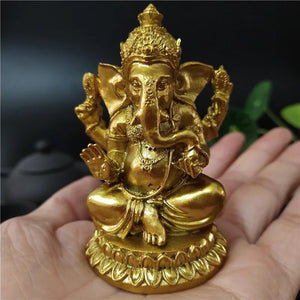 Statue Ganesha pose méditation vue de côté résine