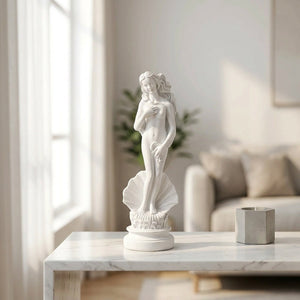 Statue Vénus résine blanche sur console marbre salon contemporain lumière naturelle