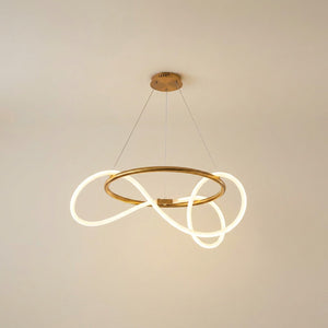 Suspension anneau LED finition dorée fond beige neutre
