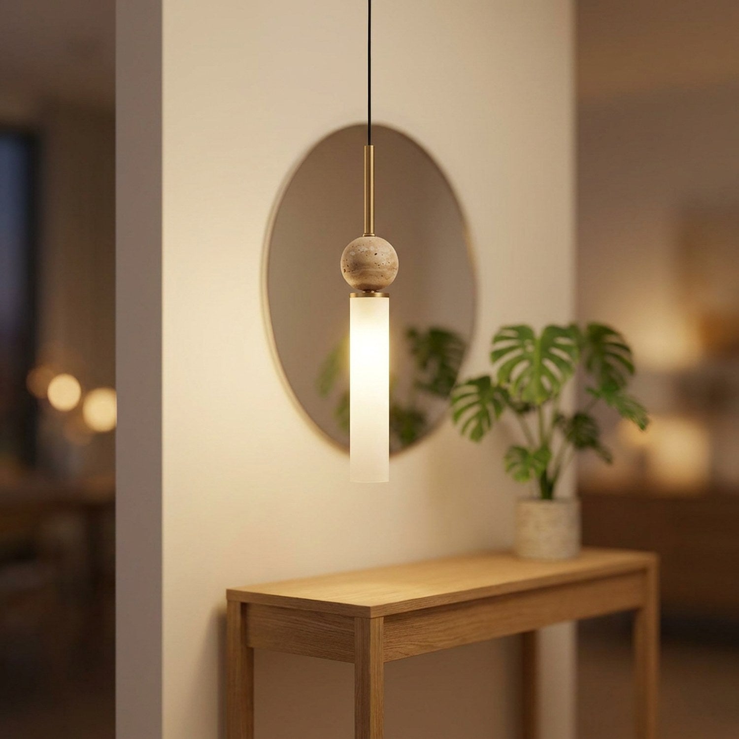 Suspension en pierre naturelle au-dessus d'une console d'entrée avec miroir