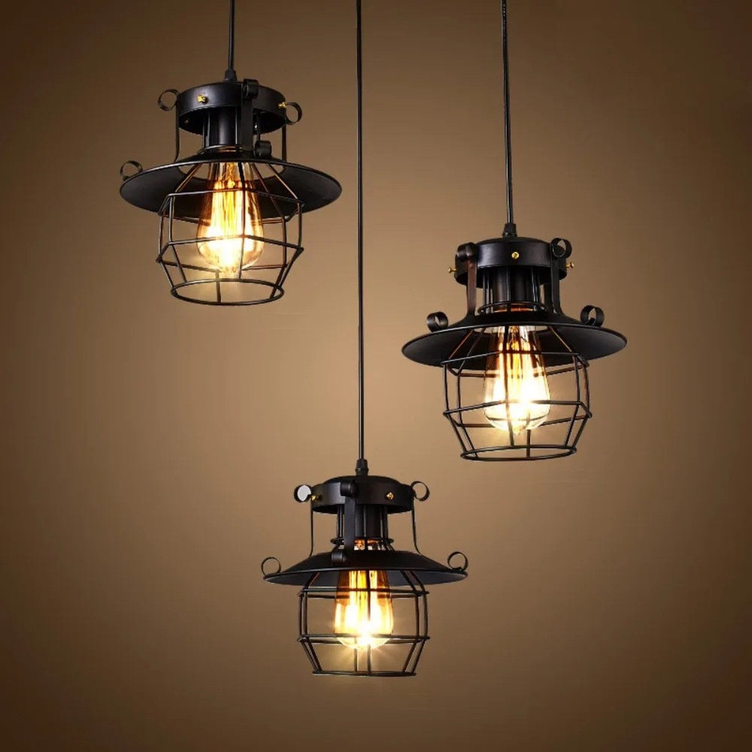 Trio suspensions industrielles cage metal fond ambre bar vintage