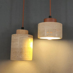 Duo suspensions travertin illuminées dans la pénombre