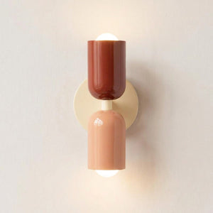 Applique murale nordique bicolore terracotta et pêche fixée au mur