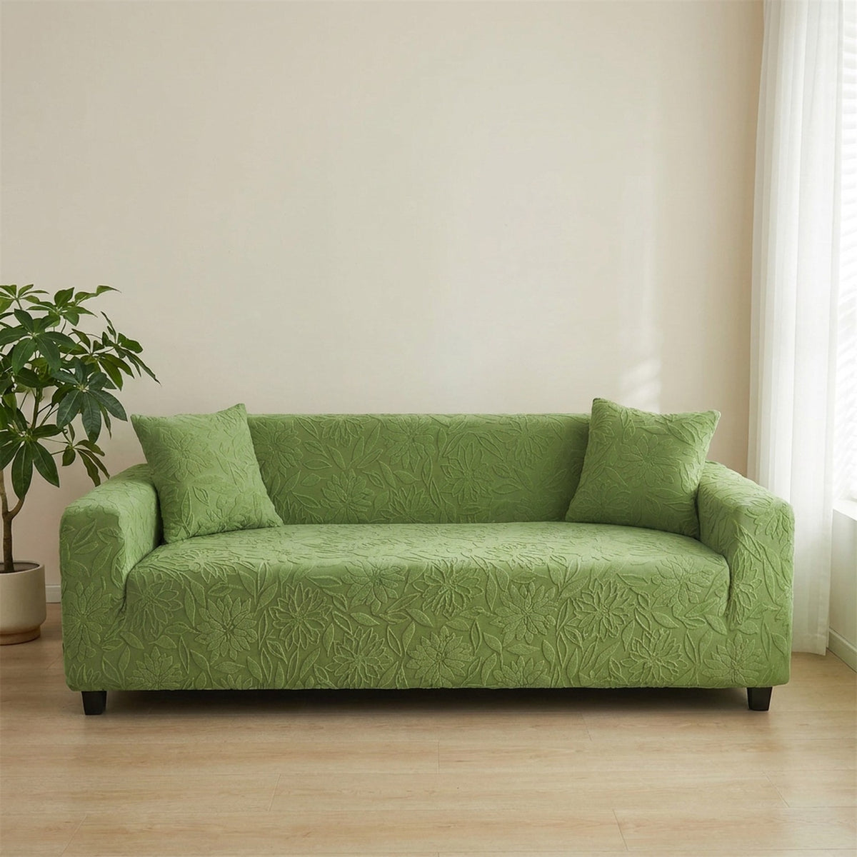 Housse de canapé verte jacquard camélia en situation salon