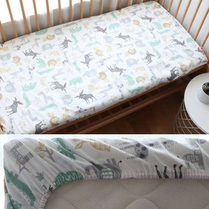 Drap housse bébé motif animaux pastel de la savane