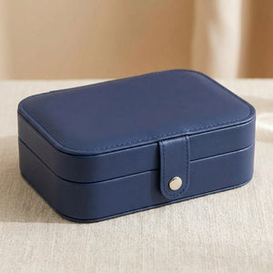Boîte à bijoux de voyage en simili cuir coloris bleu marine