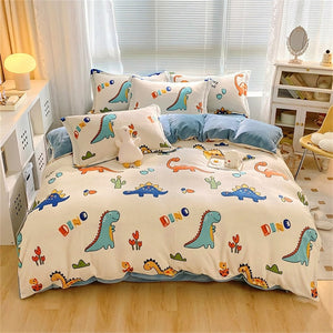 Parure de lit dinosaure motif Dino Coloré posée sur un lit fait
