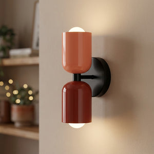 Applique murale LED double tête rose et rouge sur socle noir