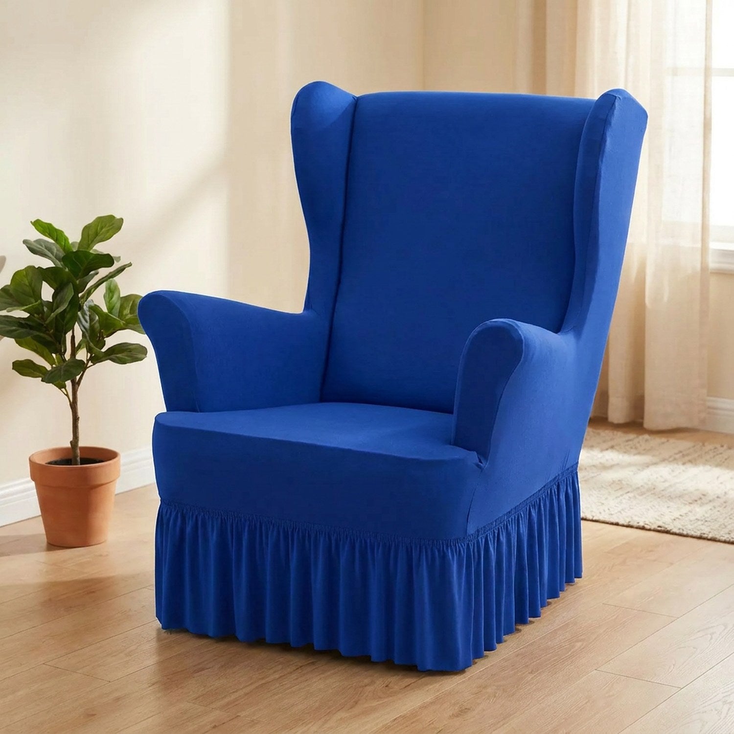 Housse de fauteuil à oreilles bleue avec jupe à volants
