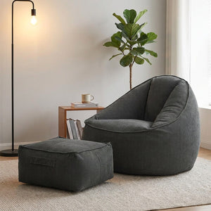 Fauteuil pouf et repose-pieds en velours côtelé gris foncé