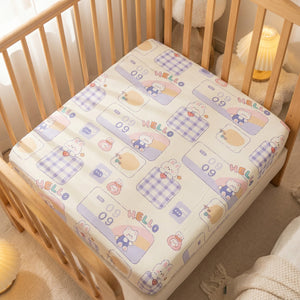 Drap housse bébé motif ourson et lapin Hello sur un matelas de berceau