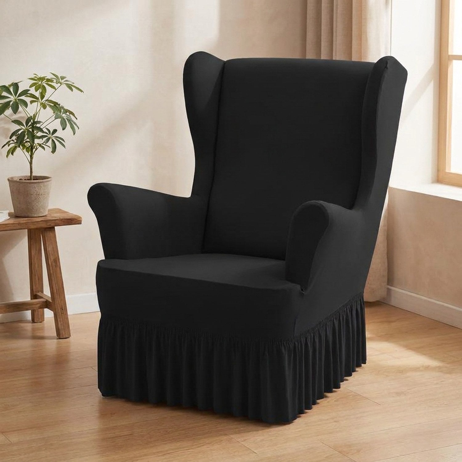 Housse de fauteuil à oreilles noire avec jupe à volants