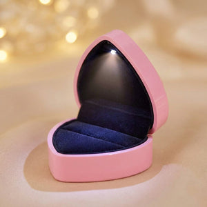 Boîte à bijoux rose en forme de cœur avec lumière LED et intérieur en velours