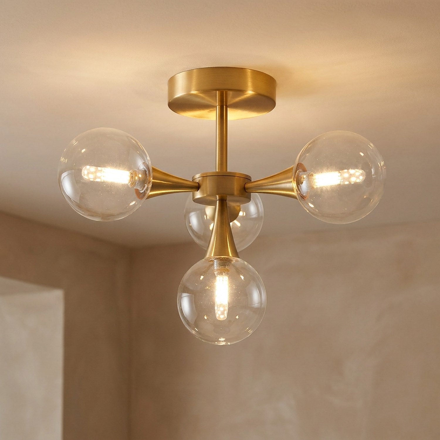 Lustre art deco coloris transparent modele 4 globes bouquet