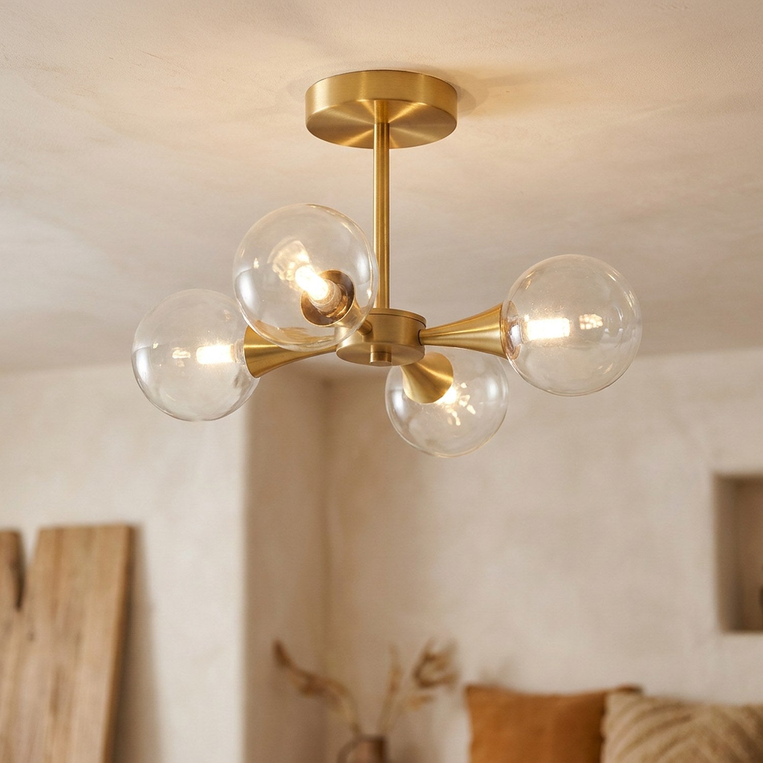 Lustre art deco coloris transparent modele 4 globes etoile
