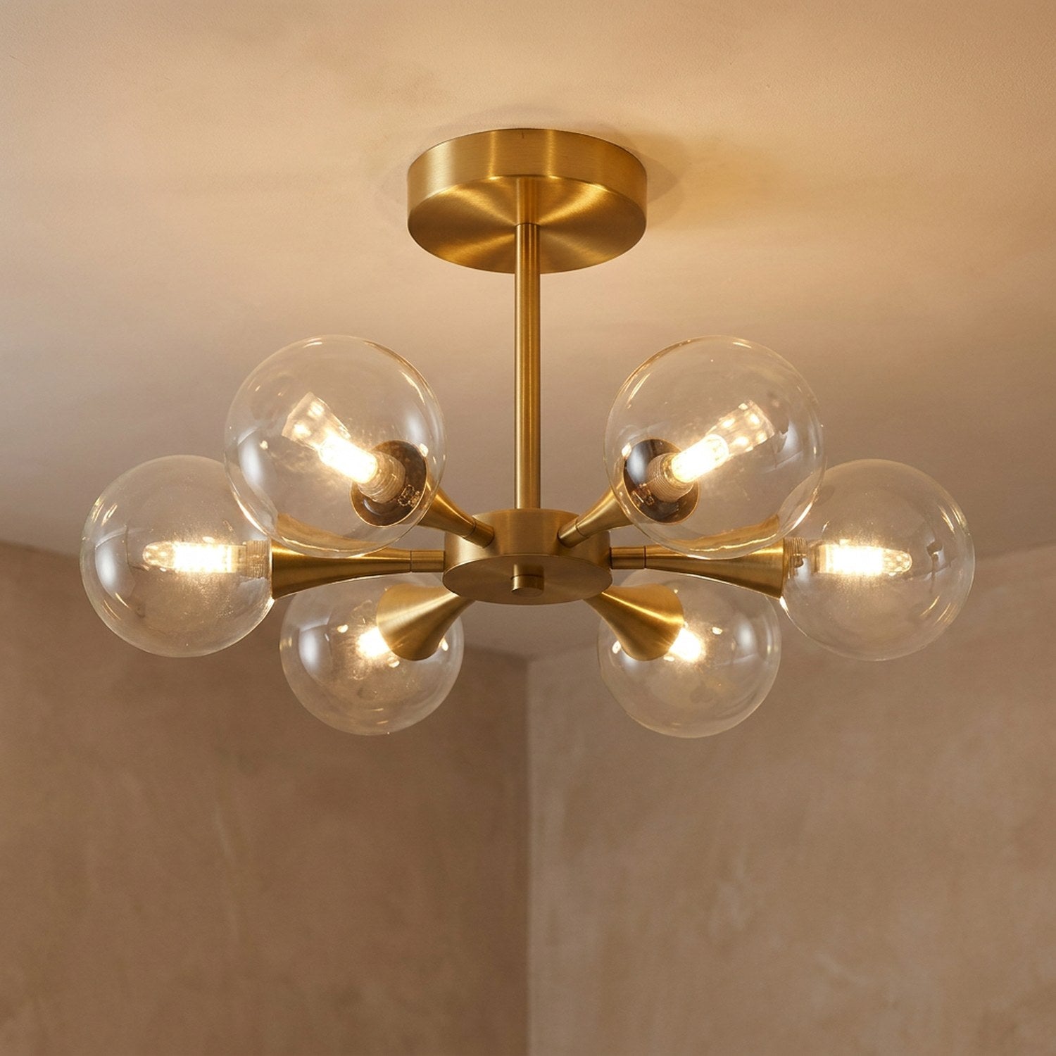 Lustre art deco coloris transparent modele 6 globes etoile