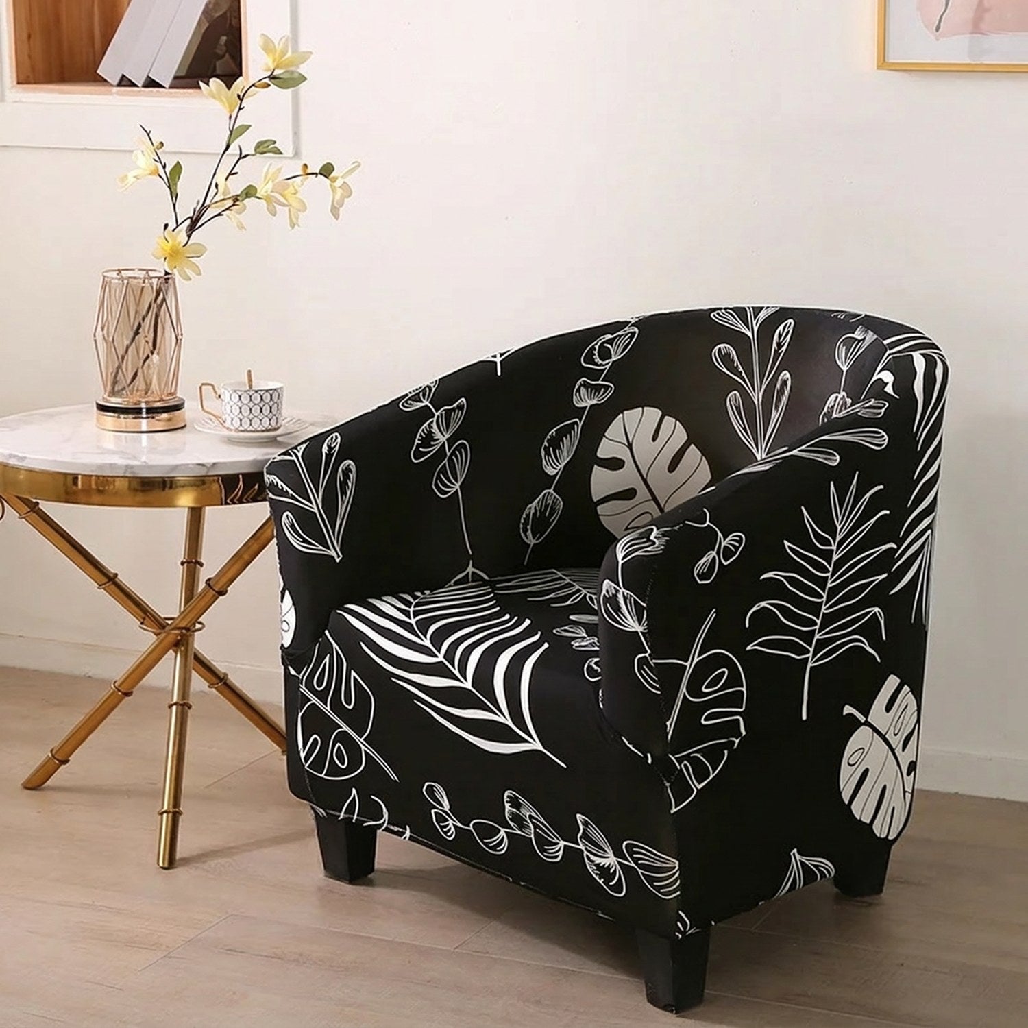 Housse de fauteuil cabriolet motif feuillage blanc sur fond noir