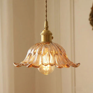 Suspension florale en verre ambré miel avec monture laiton dorée ampoule Edison