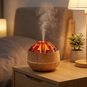 Humidificateur diffuseur volcan coloris bois clair sur une table de chevet