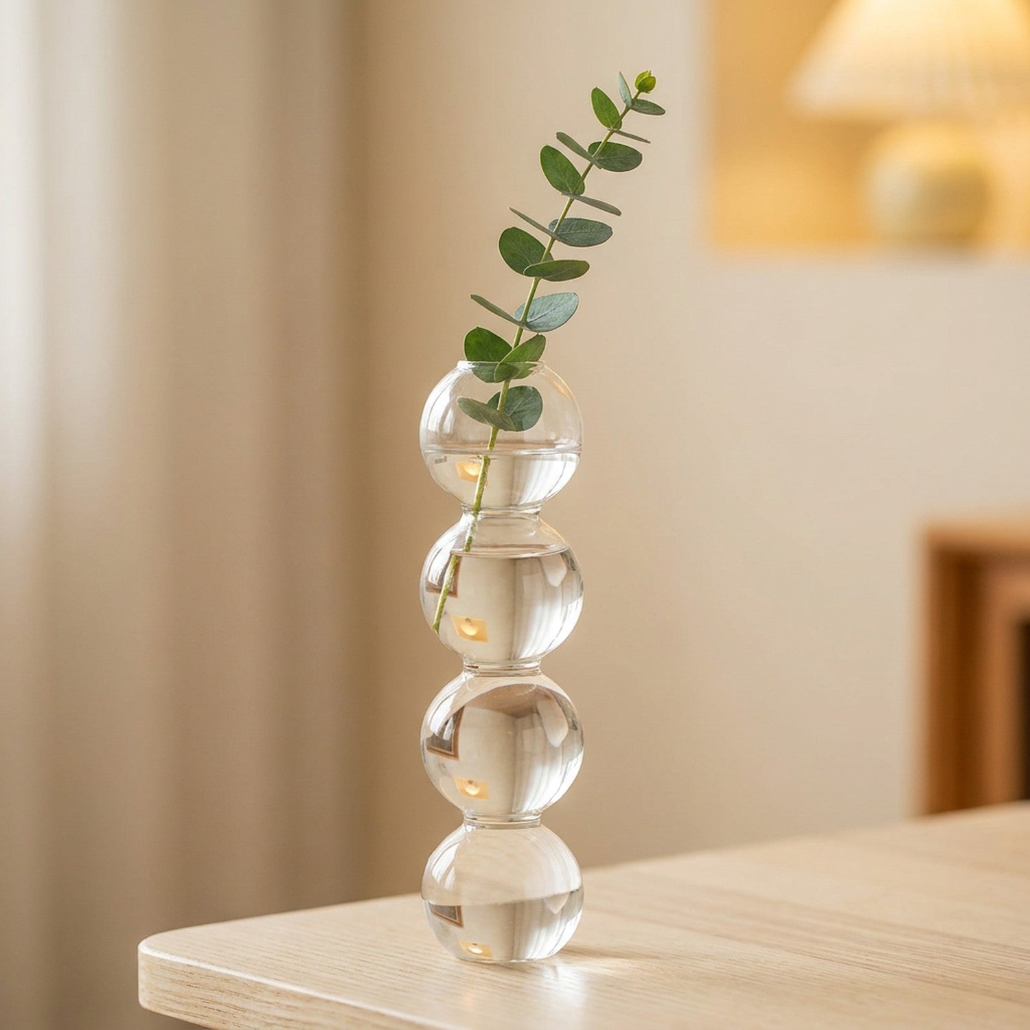 Grand vase en verre à bulles 23 cm avec un brin d'eucalyptus
