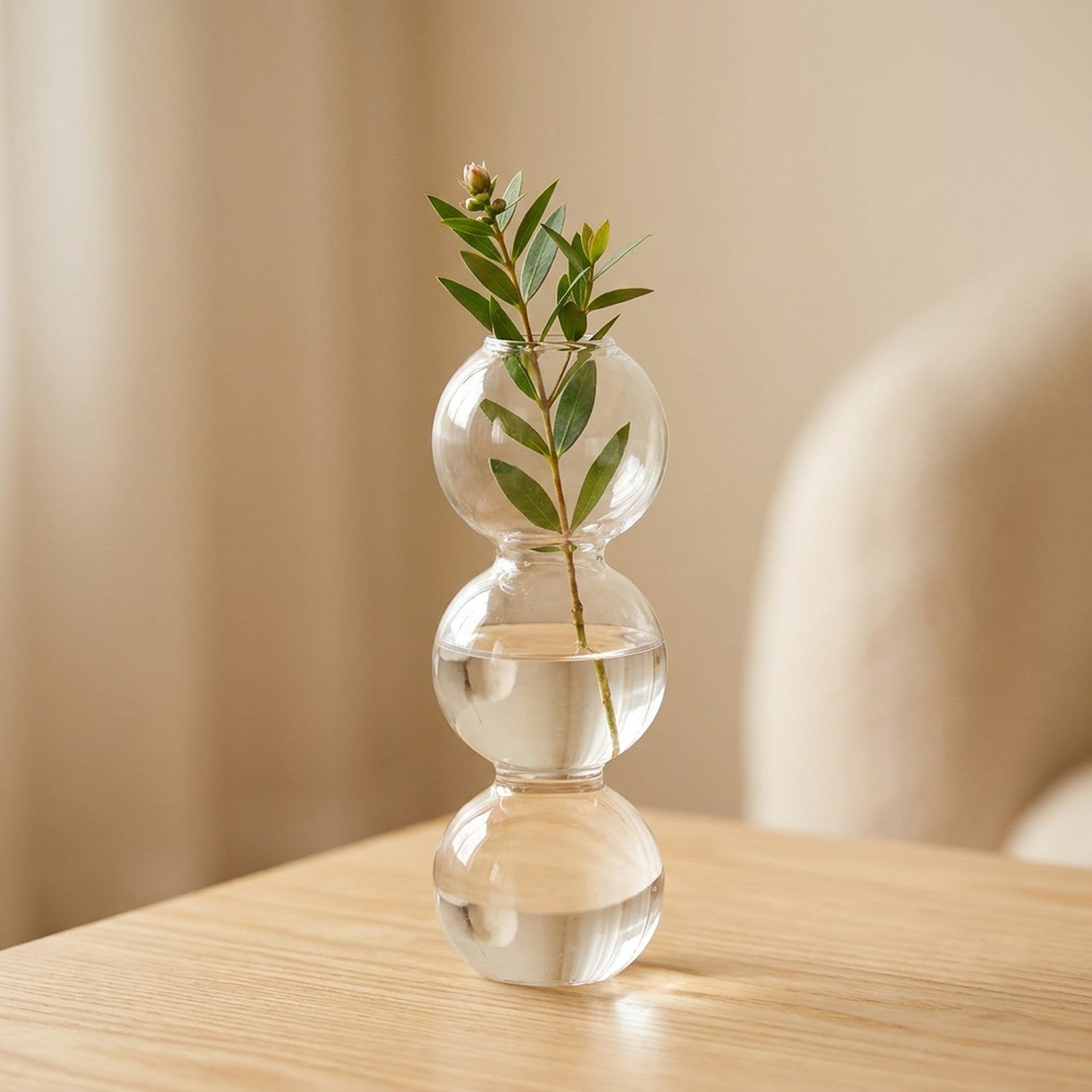 Petit vase en verre à bulles 17 cm avec une tige fleurie