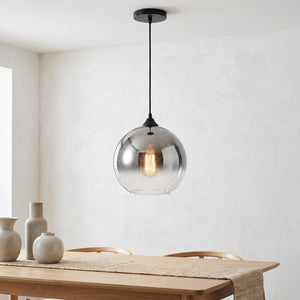 Suspension boule de verre au dégradé argenté avec cordon noir et ampoule Edison