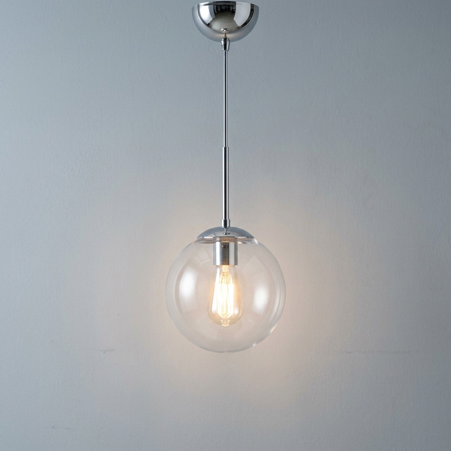 Suspension boule verre transparent finition argentée chrome luminaire