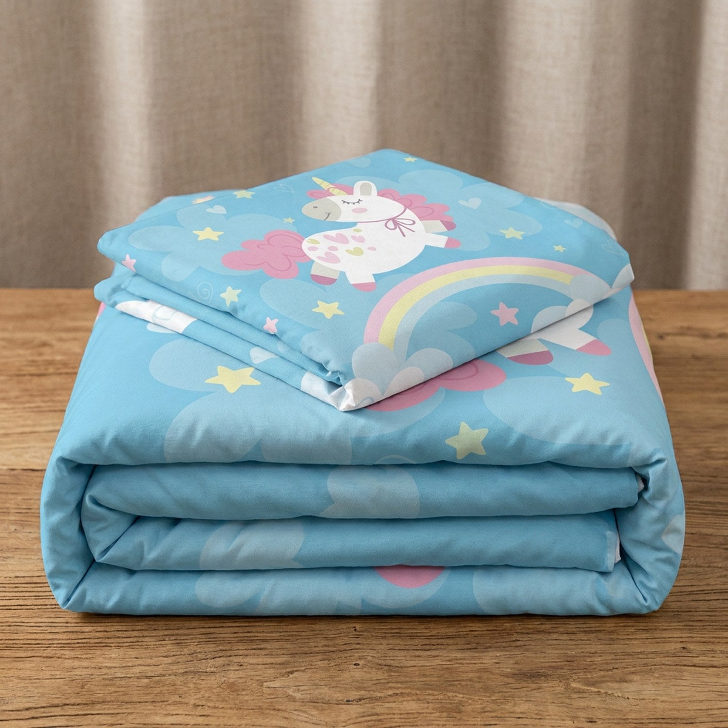 Parure de lit licorne bleue pliée avec taie assortie
