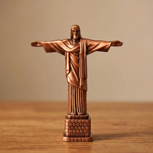 Statuette Christ Rédempteur finition cuivre rouge-brun sur surface bois