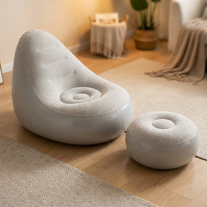 Fauteuil gonflable de relaxation floqué gris avec son pouf repose-pieds