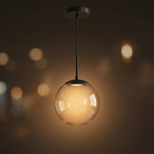 Suspension boule verre transparent finition noire mat luminaire design