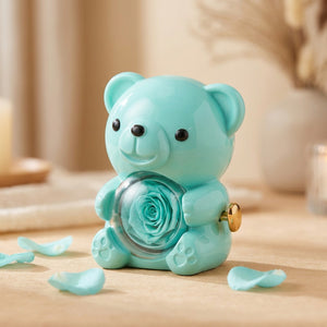 Boîte à bijoux ourson turquoise avec rose pivotante