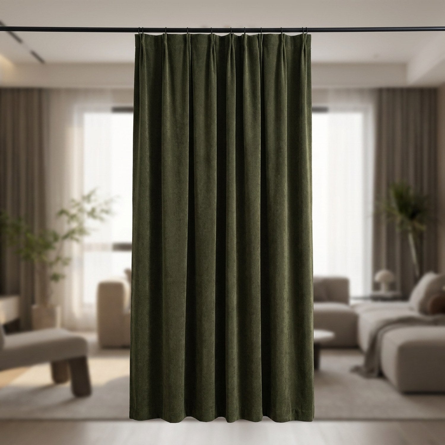 Rideau occultant velours chenille couleur vert foncé suspendu à une fenêtre