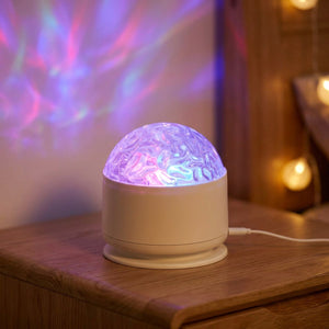 Veilleuse projecteur galaxie effet aurore boréale violet et rose projeté au mur
