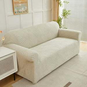 Housse de canapé motif feuilles beige