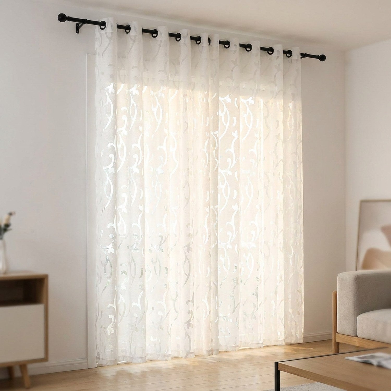 Rideau voilage jacquard blanc à œillets suspendu à une tringle