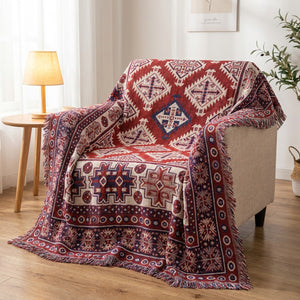 Jeté de canapé motif bohème rouge et bordeaux avec franges
