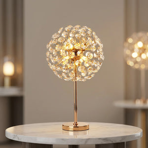 Lampe de table en cristal doré modèle Pied droit allumée salon