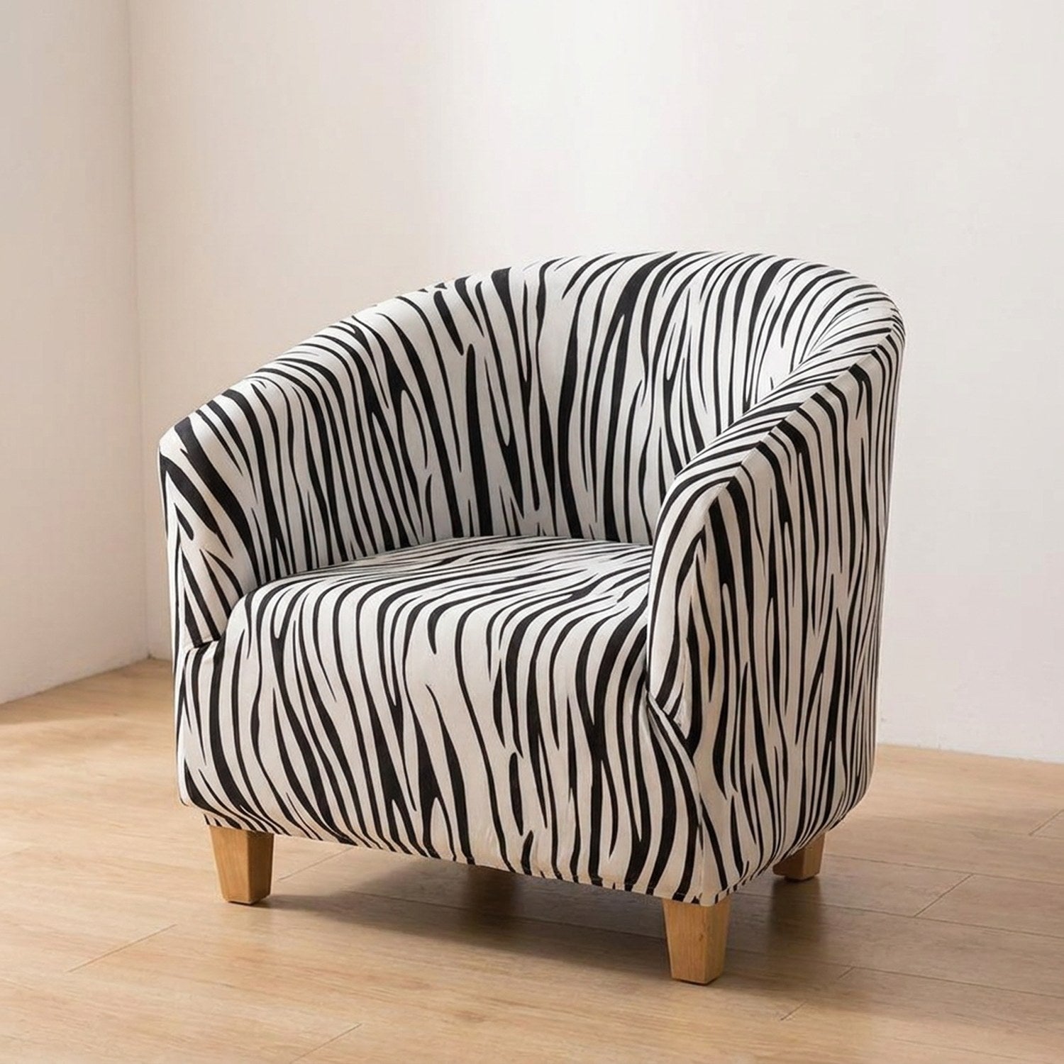 Fauteuil club housse motif zébré noir et blanc