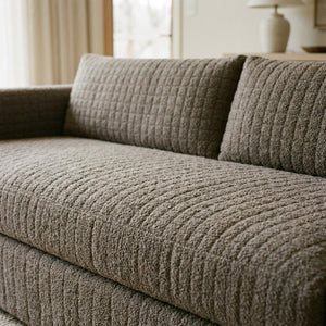 Housse de canapé bouclé coloris taupe
