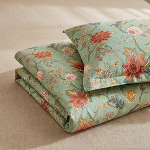 Parure de lit trois pieces motif fleurs vintage pliee